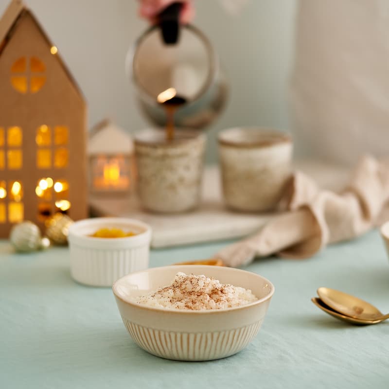 rice-pudding-woman-pouring-coffee-from-coffee-mak-2023-11-27-05-23-23-utc (1)